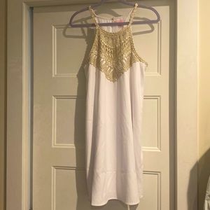 Lily Pulitzer white dress with gold high neck with intricate chest piece